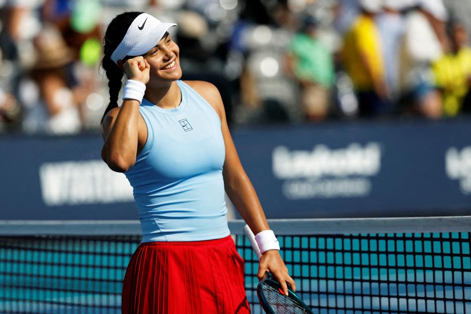 Emma Raducanu celebrates a tennis match victory.