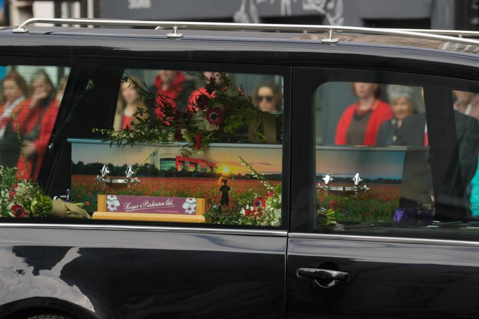 Tragic painted coffin of football-mad schoolgirl, 10, hit & killed by car on pitch as mourners gather for her funeral