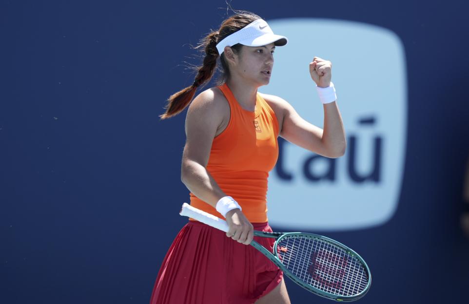 Emma Raducanu celebrates winning a tennis match.