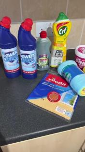 Cleaning supplies on a countertop.