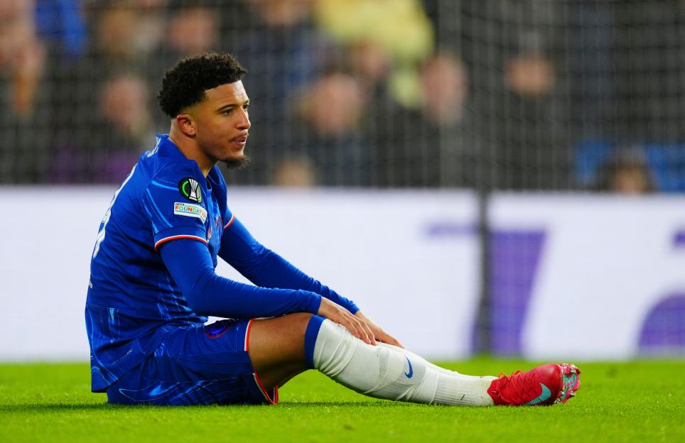 Jadon Sancho of Chelsea sitting on the field.