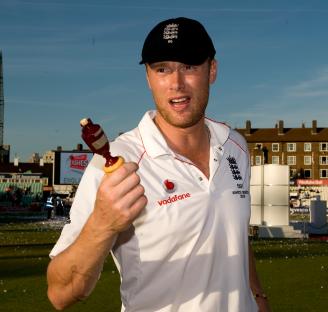 Freddie Flintoff holding the Ashes urn.
