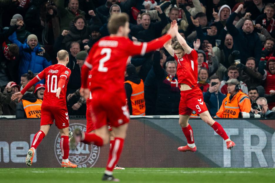 Rasmus Hojlund of Denmark celebrates scoring a goal.