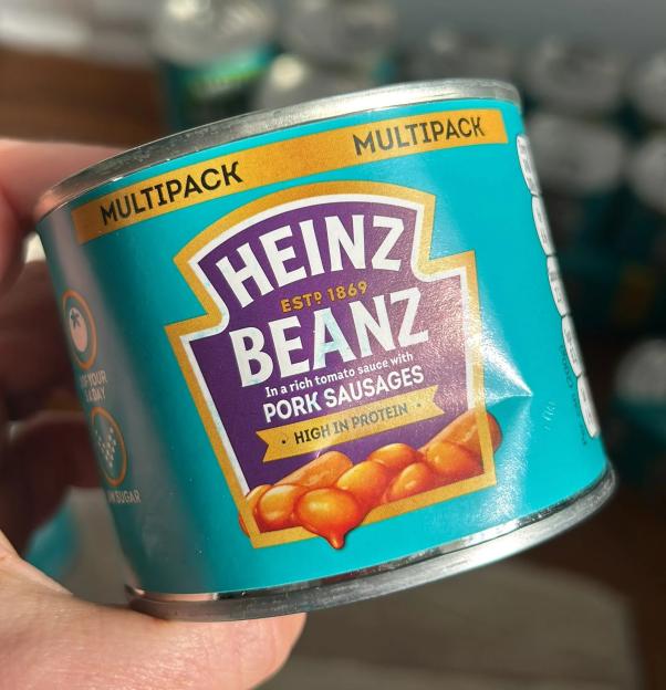 Heinz Beanz can in hand.