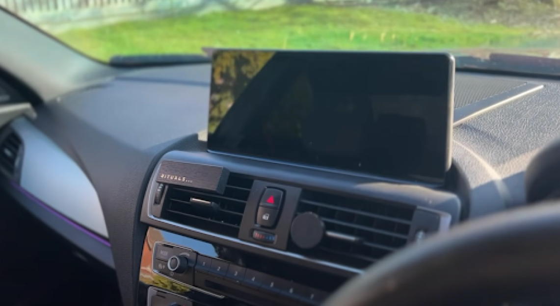 Tablet mounted in a BMW's dashboard.