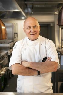 Chef Aldo Zilli in a kitchen.