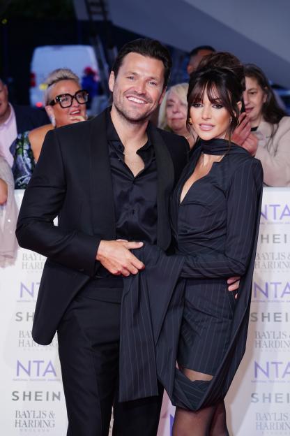 Michelle Keegan and Mark Wright at an awards ceremony.