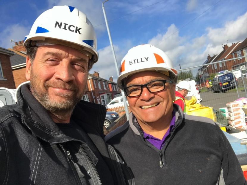 Photo of Nick and Billy on a construction site.