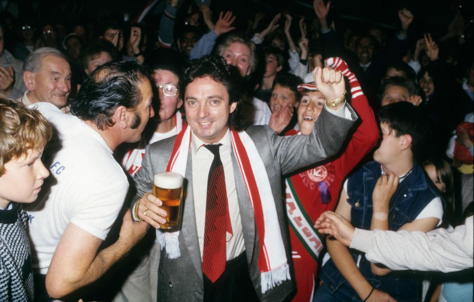 Terry Ramsden, millionaire entrepreneur and racehorse owner, celebrating with Walsall FC fans in 1986.