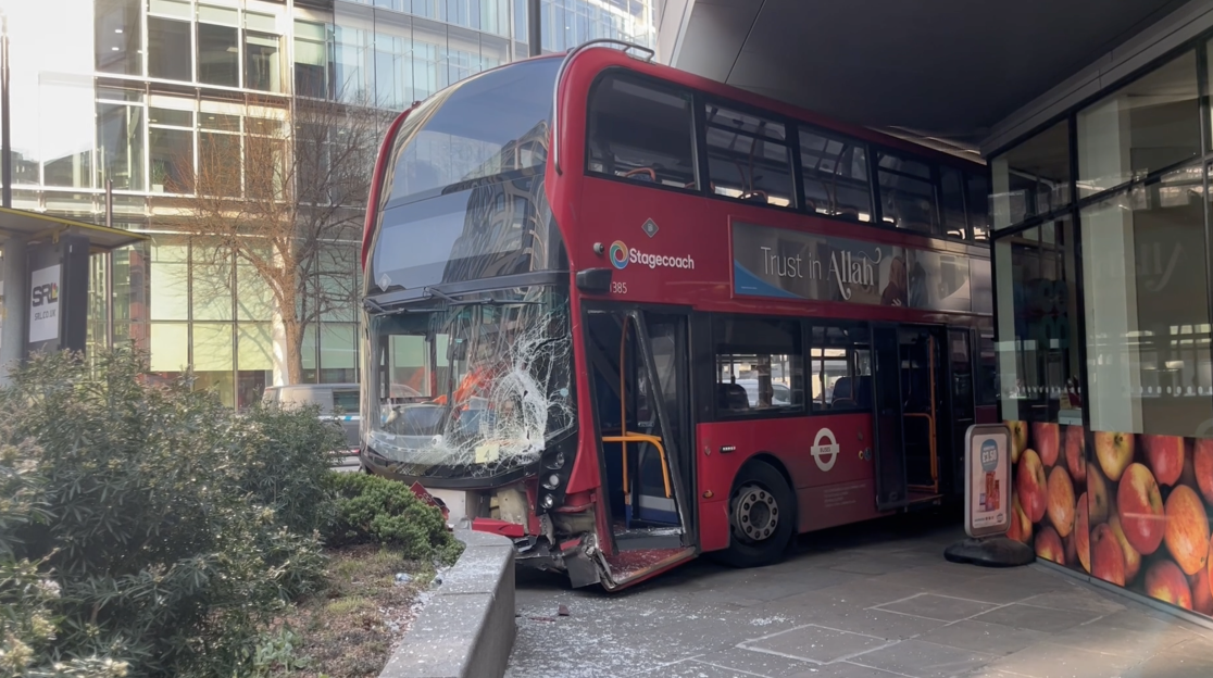 Three injured in bus crash at London tourist hotspot as double decker seen crushed at scene sparking traffic chaos