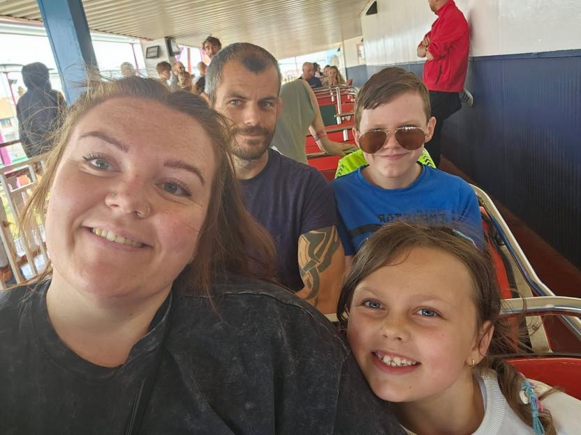 Family selfie on a ride.