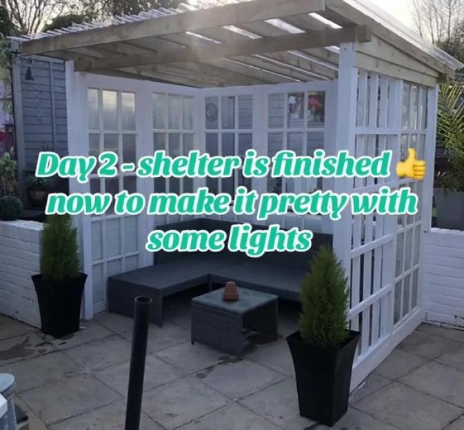 Garden shelter built from free Facebook Marketplace doors.