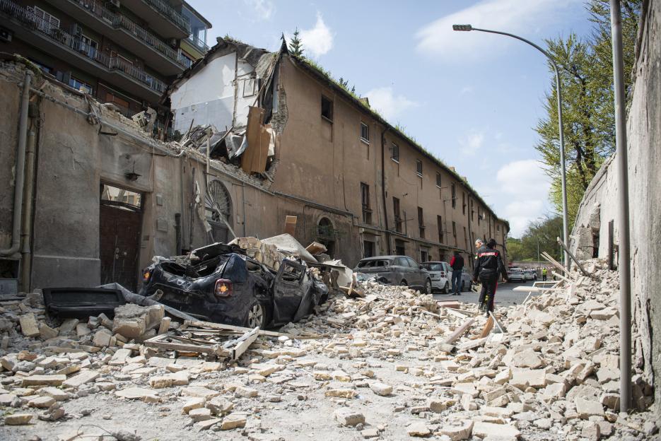 Emergency responders at the scene of a building explosion.