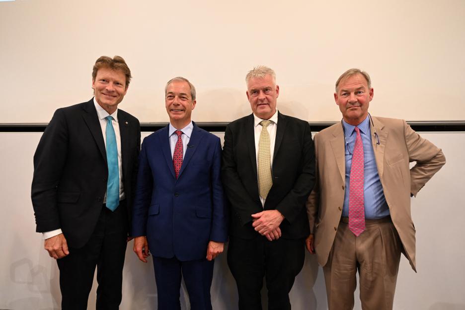 Four Reform UK MPs posing for a photo.