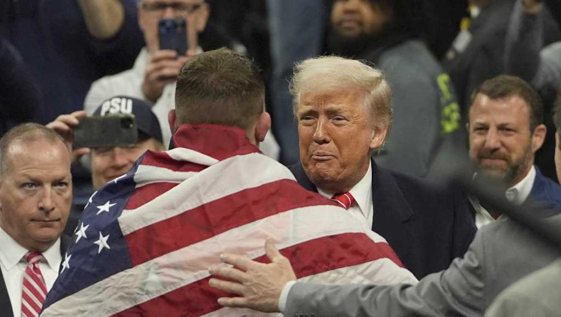 Donald Trump attends NCAA wrestling, celebrates with heavyweight champion, Hendrickson