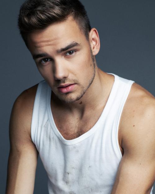 Liam Payne portrait, wearing a white tank top.