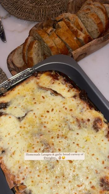 Homemade lasagna and garlic bread.