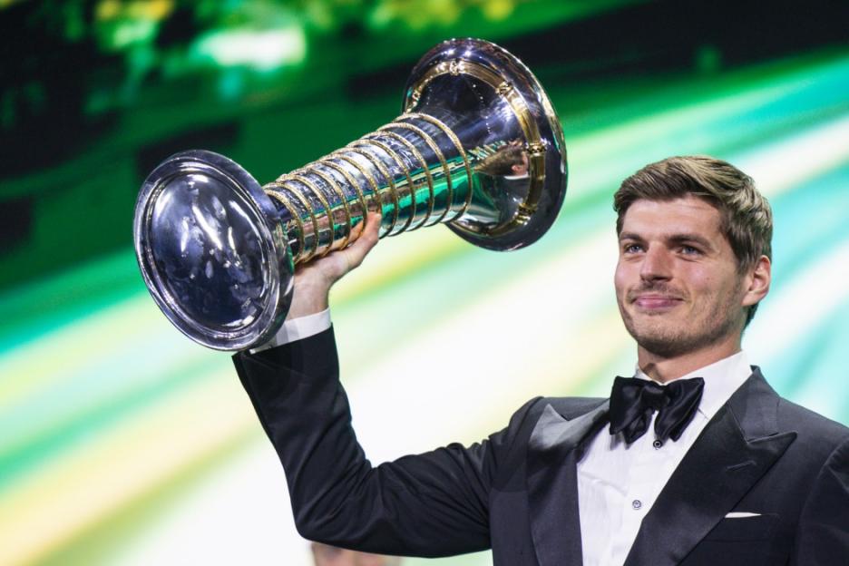 KIGALI, RWANDA - DECEMBER 13: In this handout provided by Federation Internationale de l'Automobile (FIA), F1 Champion Max Verstappen of Netherland and Oracle Red Bull Racing receives the 1st position award during the FIA Awards 2024 on December 13, 2024 in Kigali, Rwanda. (Photo by Handout/FIA/DPPI via Getty Images )