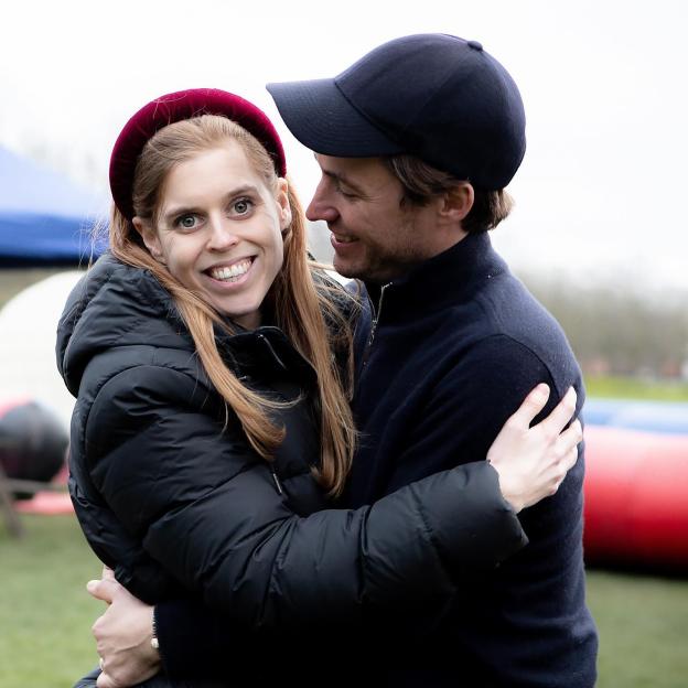 Princess Beatrice and Edoardo Mapelli Mozzi hugging, announcing they are expecting their second child.