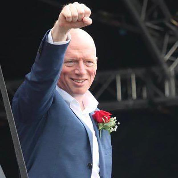 Matt Wrack raising his fist.