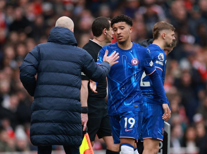 Jadon Sancho of Chelsea speaks with his manager.