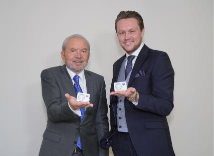 Winner of the latest series of the BBC programme The Apprentice, Dean Franklin (right), owner of an air conditioning company, with Lord Sugar in the boardroom of Amshold House in Loughton, Essex. Issue date: Thursday April 17, 2025. PA Photo. The 78-year-old will now go into business with Franklin and invest ¿250,000 in his air conditioning business, after Anisa Khan, owner of an Indian-Italian fusion pizza company, was beaten in Thursday's final of the BBC business show. See PA story SHOWBIZ Apprentice. Photo credit should read: Yui Mok/PA Wire