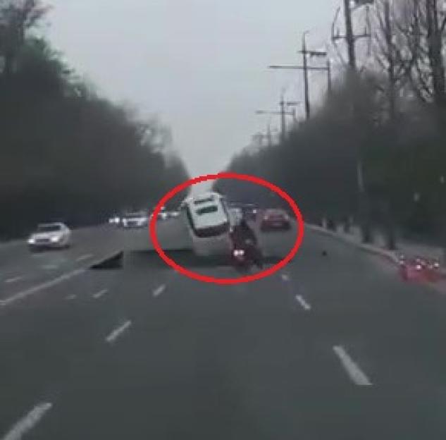 Horror moment giant sinkhole swallows biker who plunges to his death as 65ft crater opens up on busy road