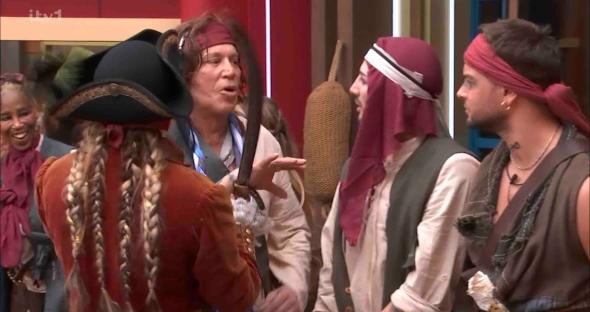 Housemates in pirate costumes during a shopping task.