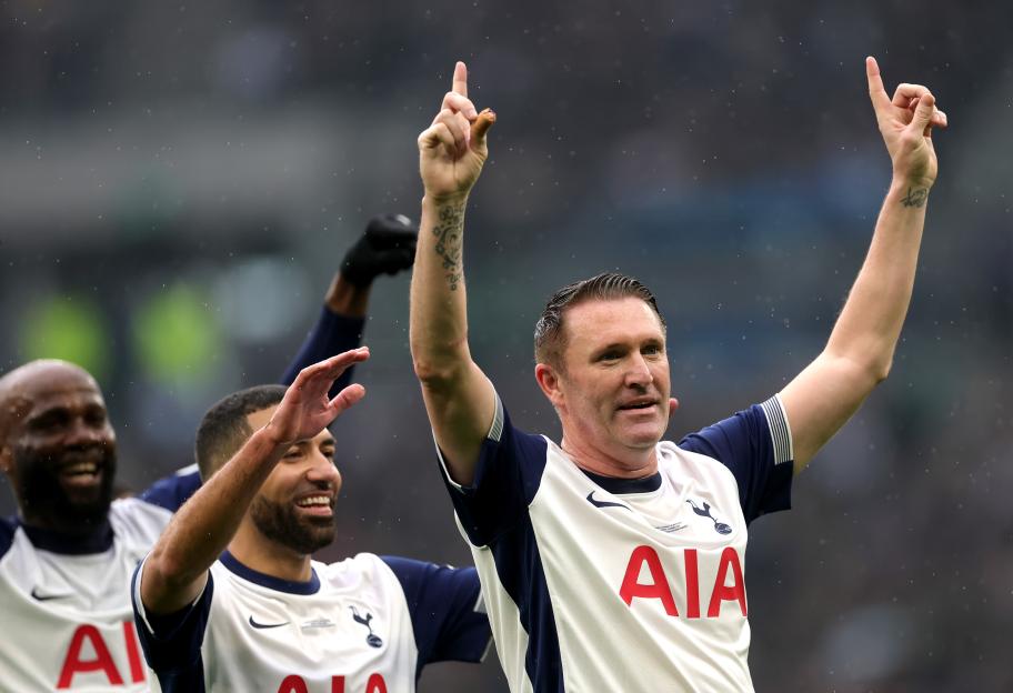 Robbie Keane of Tottenham Hotspur Legends celebrates scoring a hat-trick.