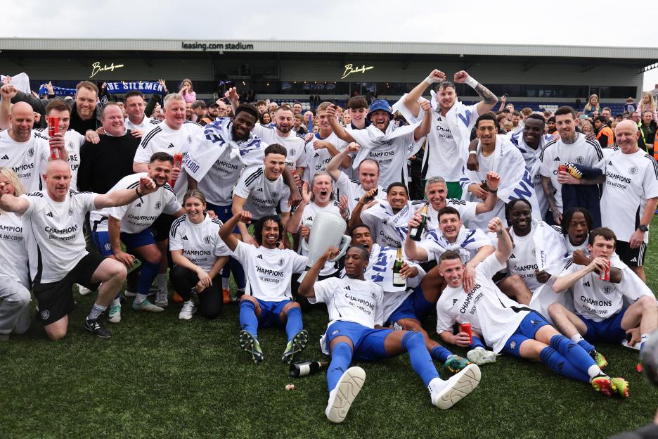 Macclesfield football team celebrates their championship win.