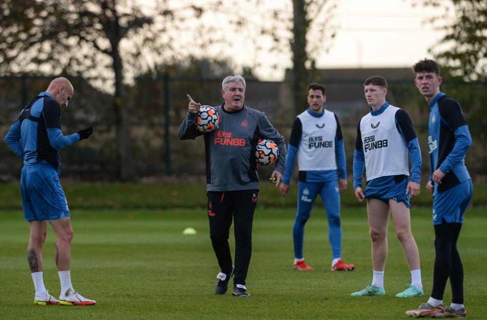 Newcastle United Head Coach Steve Bruce instructing players at training.