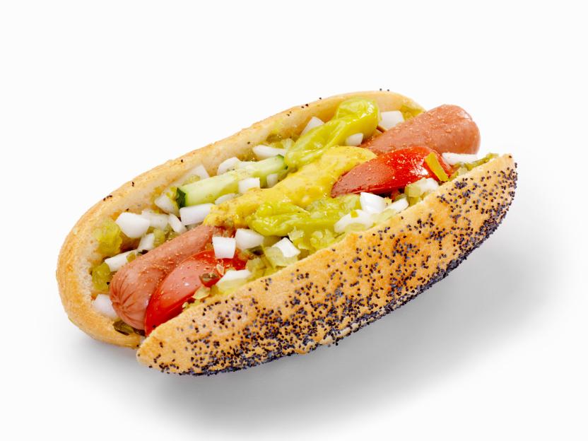 Chicago-style hot dog in a poppyseed bun.