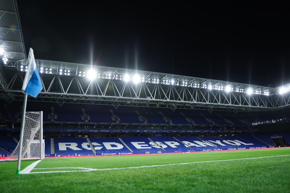 Empty soccer stadium at night.