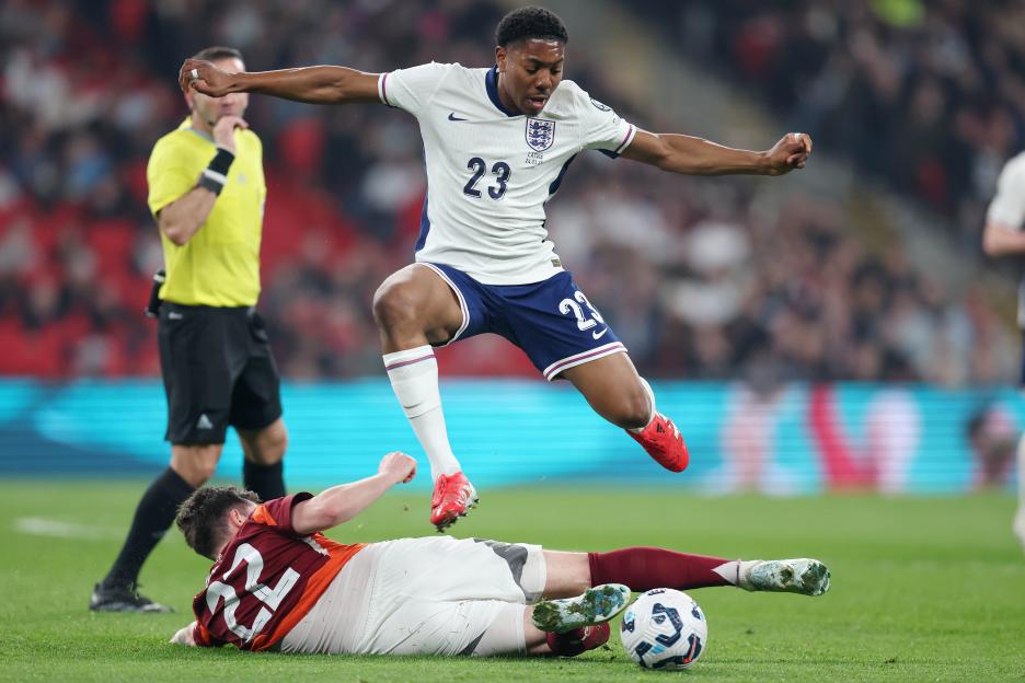 Myles Lewis-Skelly of England in action during a soccer match.