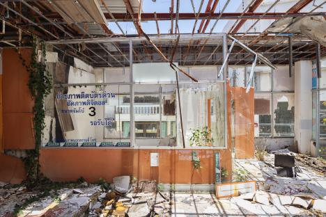 Ruined interior of a bowling alley and cinema complex.