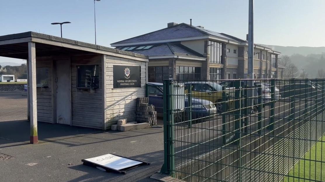 Kendal Rugby Union Football Club building and parking lot.