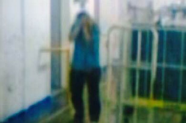 Blurry CCTV image of Rebecca Coriam.