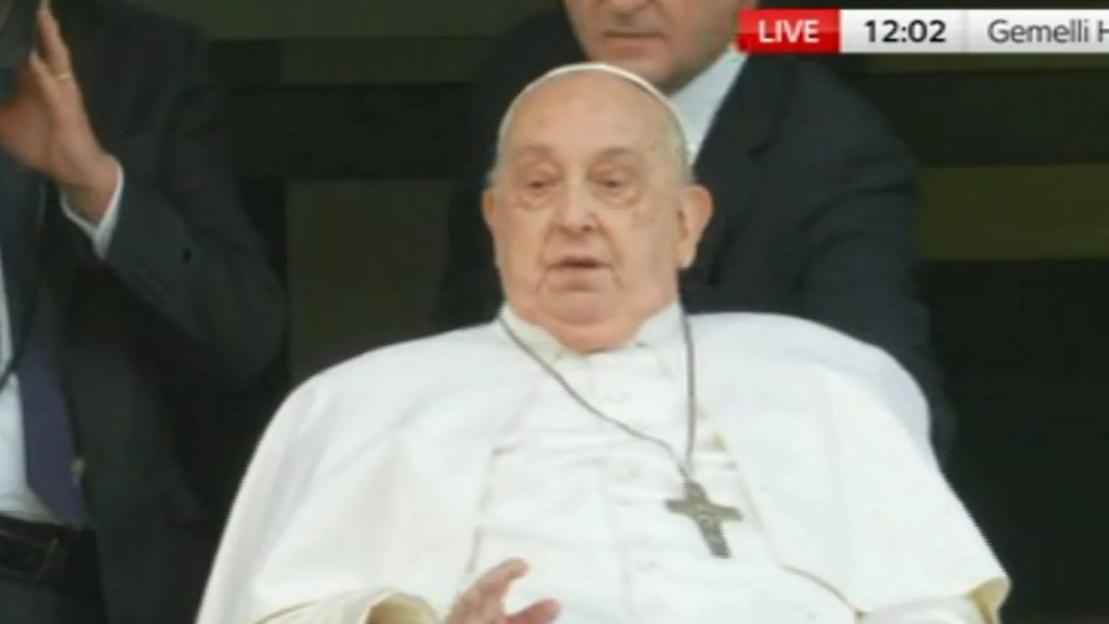 Frail Pope Francis waves from hospital window to faithful before he’s released as docs say he nearly died from pneumonia