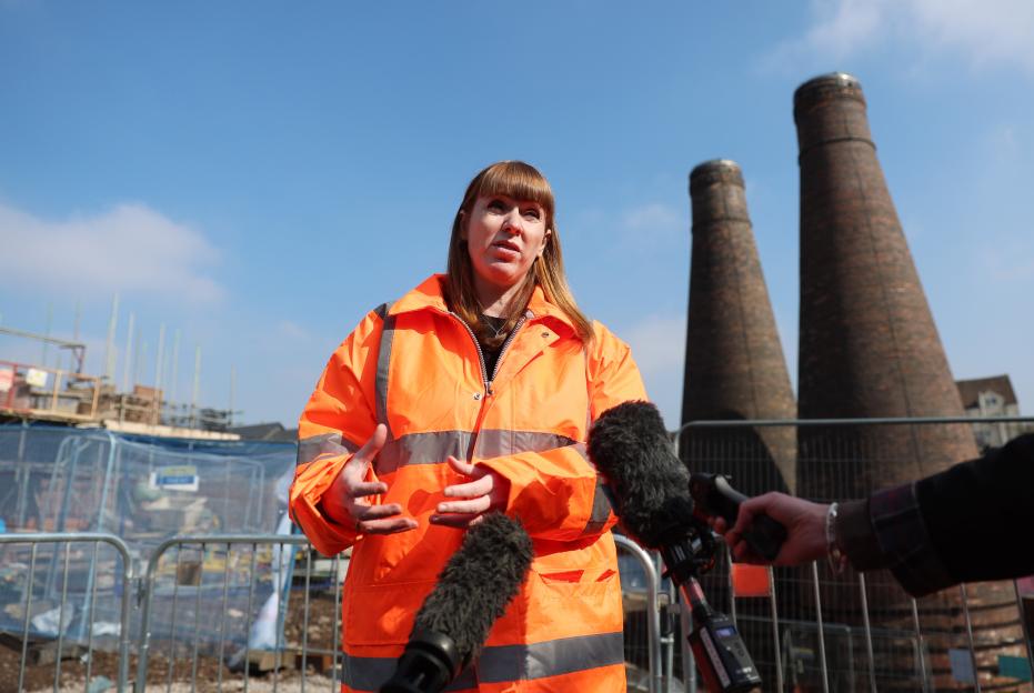 Deputy Prime Minister Angela Rayner speaks to the media at a housing development site.