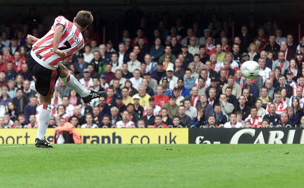 Matt Le Tissier scoring a goal.