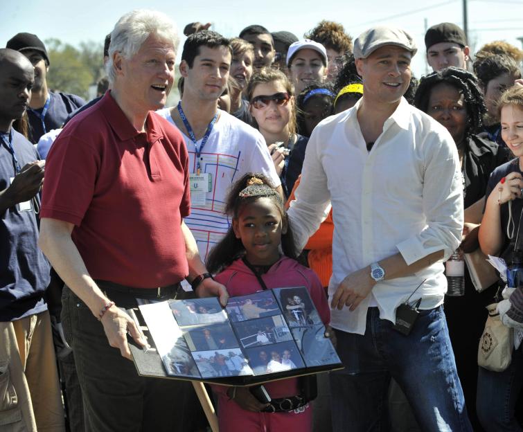 Bill Clinton and Brad Pitt at a New Orleans home rebuilding project.