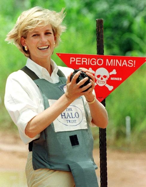 Princess Diana holding a landmine during a Red Cross visit to Angola.