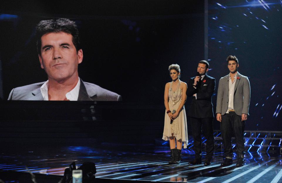 Katie Waissel, Dermot O'Leary, and Aiden Grimshaw on the X Factor results show.