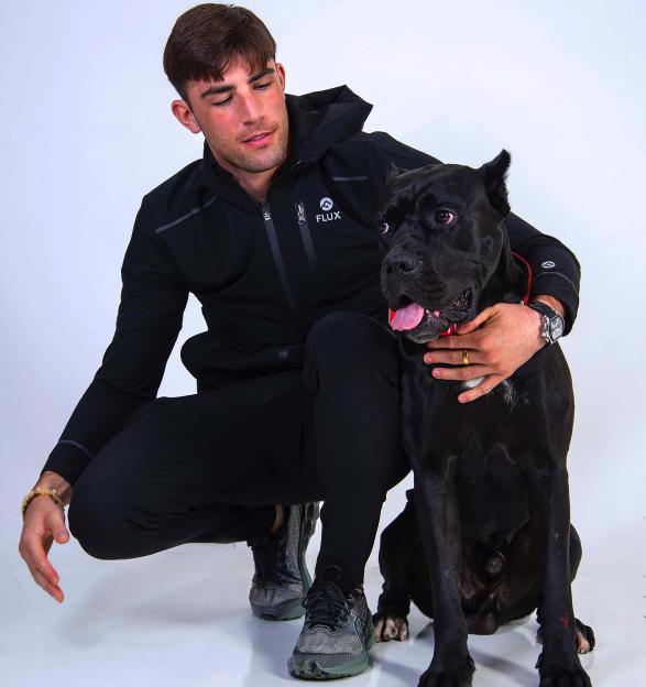 Jack Fincham with his black Cane Corso dog, Elvis.