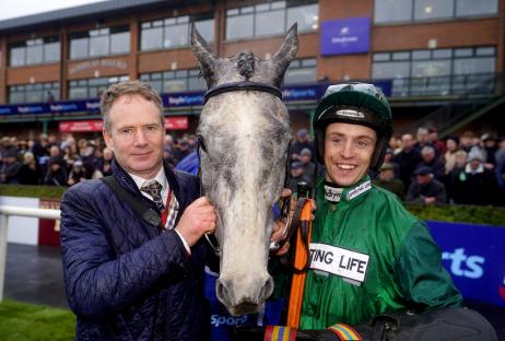 J J Slevin and trainer Tom Gibney with a racehorse.