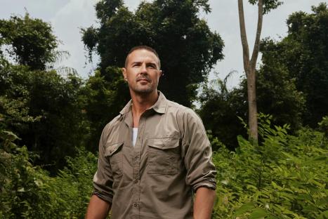 Paddy McGuinness in a jungle setting.