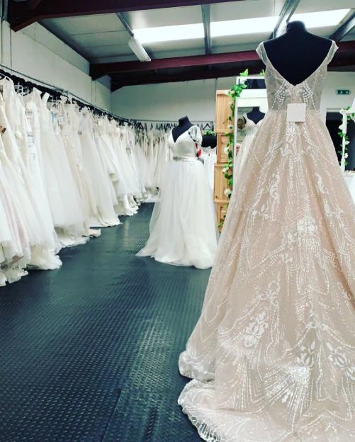 Wedding dresses in a bridal shop.