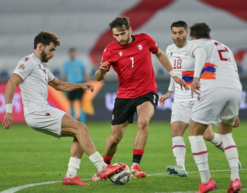 Khvicha Kvaratskhelia of Georgia in action during a soccer match.