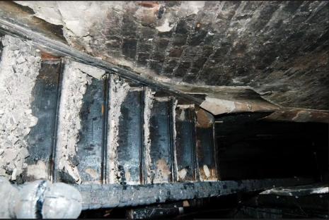 Fire-damaged staircase.