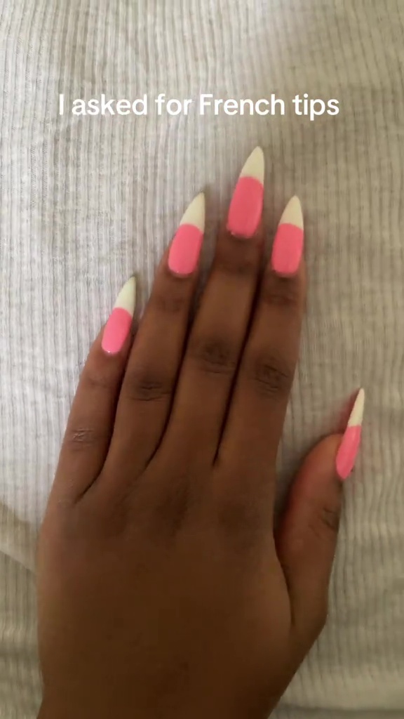 Hand with pink and white nails; the caption says "I asked for French tips".